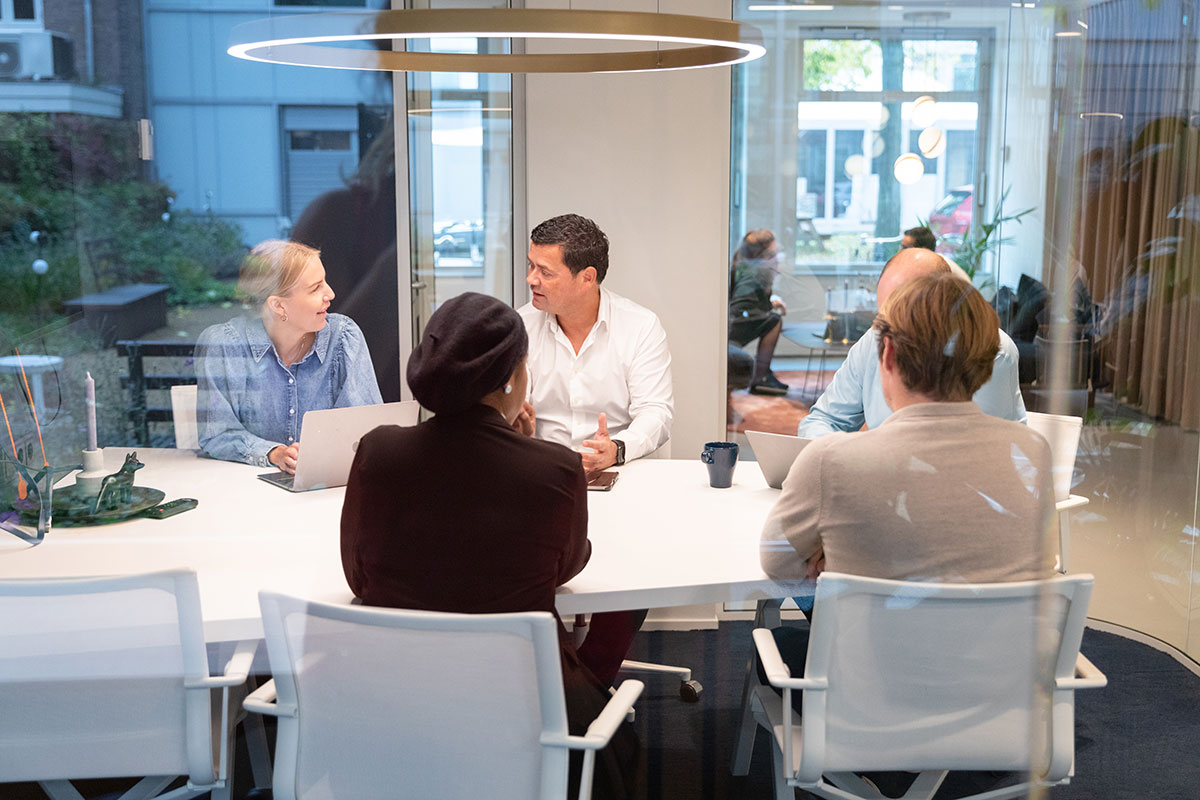 emloyees in a meeting room