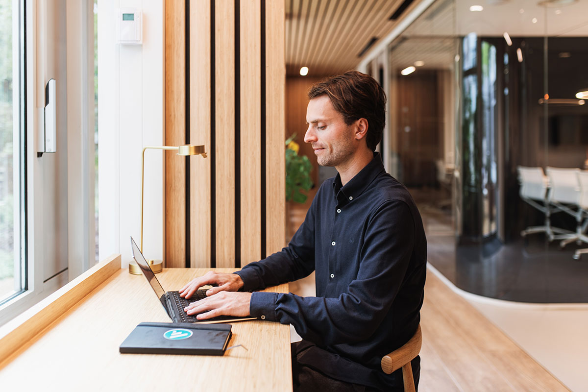 employee working on a laptop