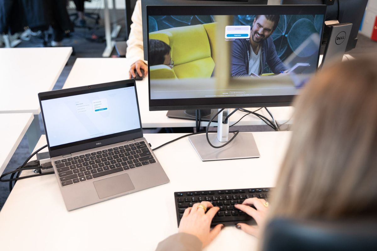 Woman sitting working on a computer