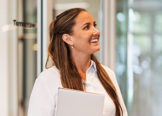 woman laughing at work