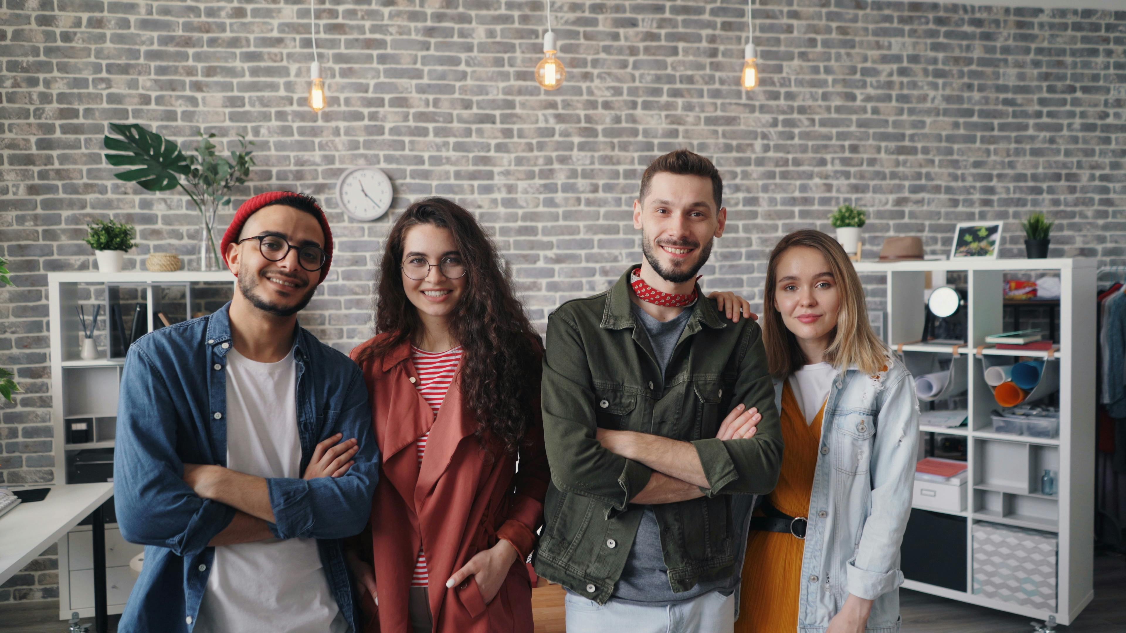 Four young people in a creative office enviroment