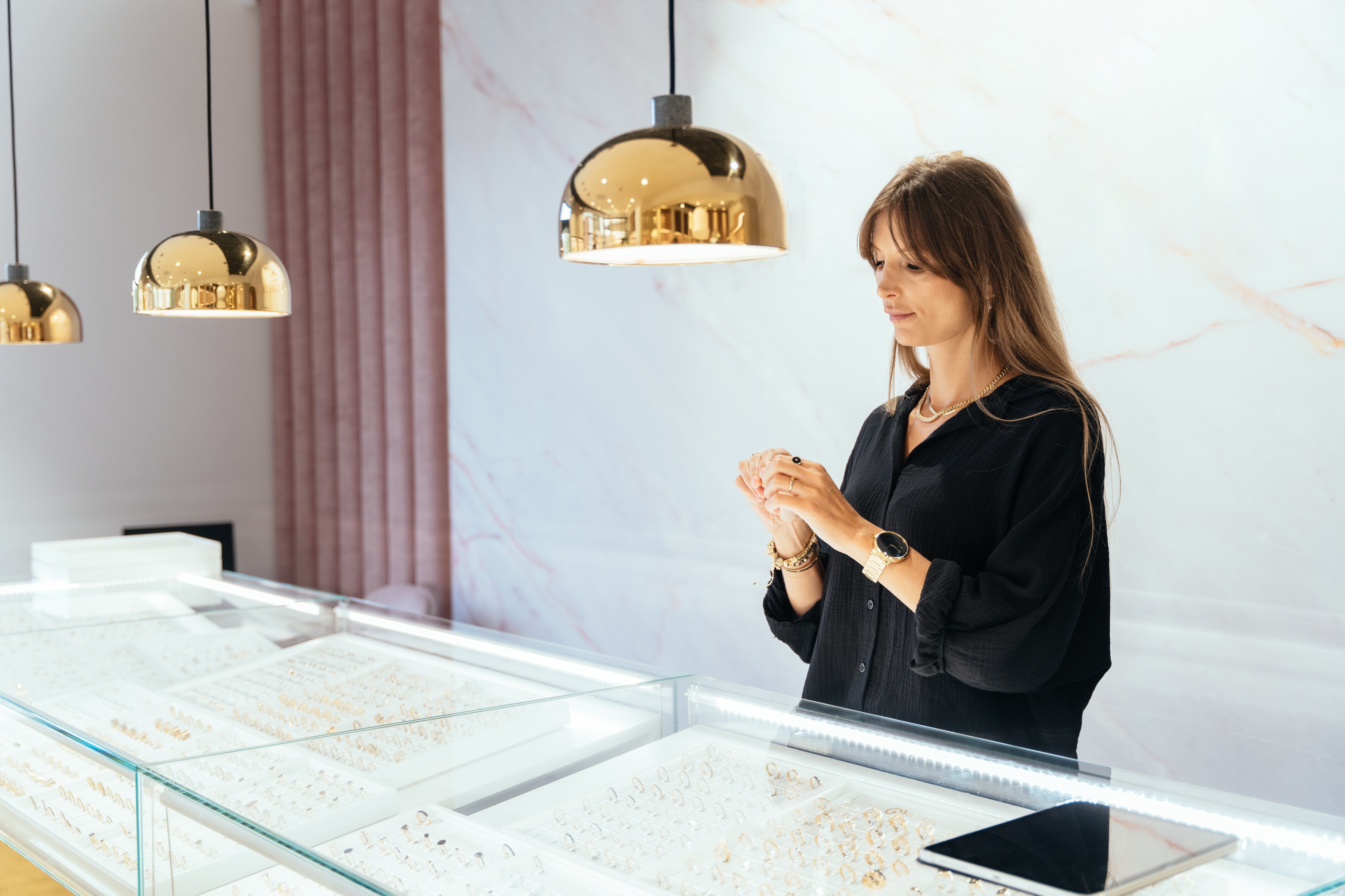 Female sale associate in an exclusive store