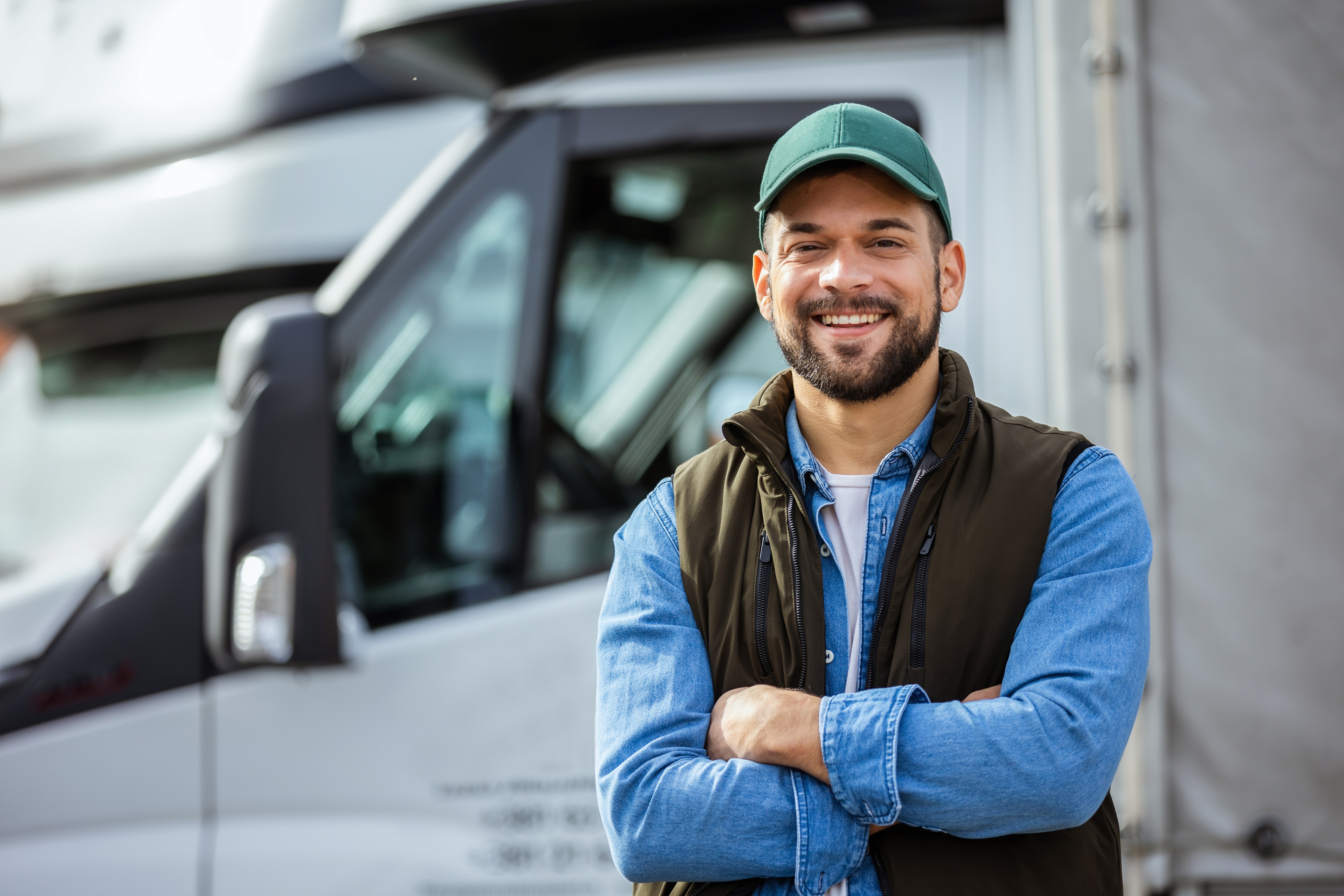 man standing in front of a truck