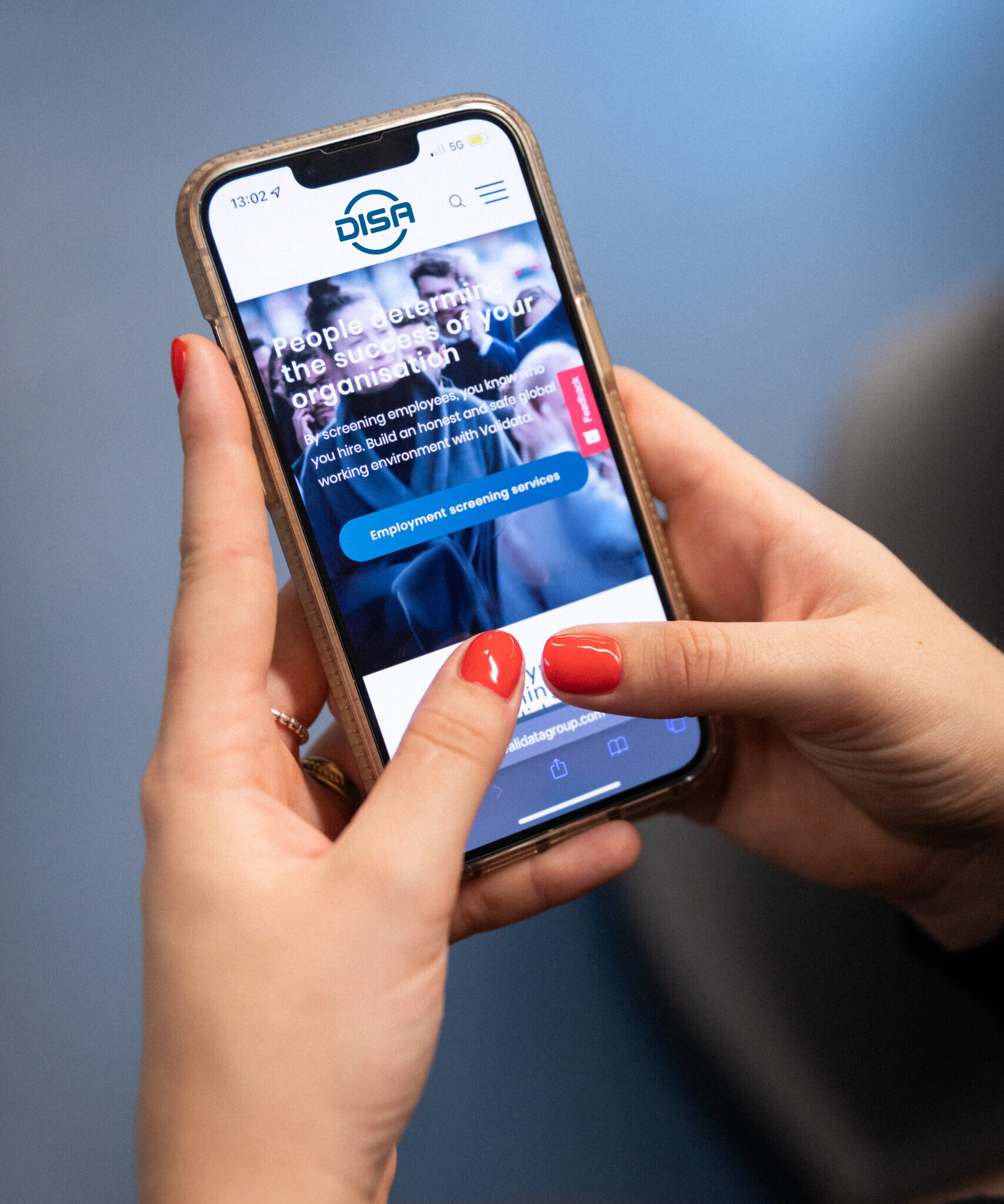 woman uses mobile phone to access DISA platform