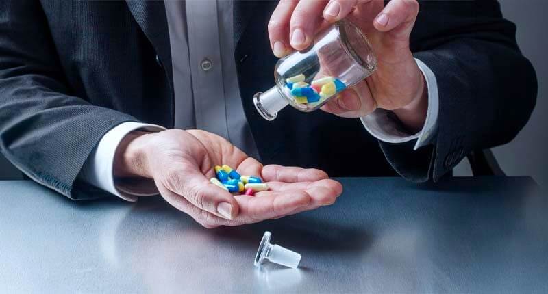 concept of abusing drugs at the office