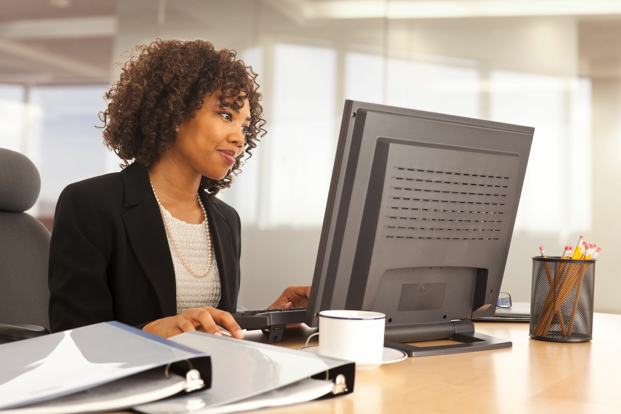 Business woman working at computer