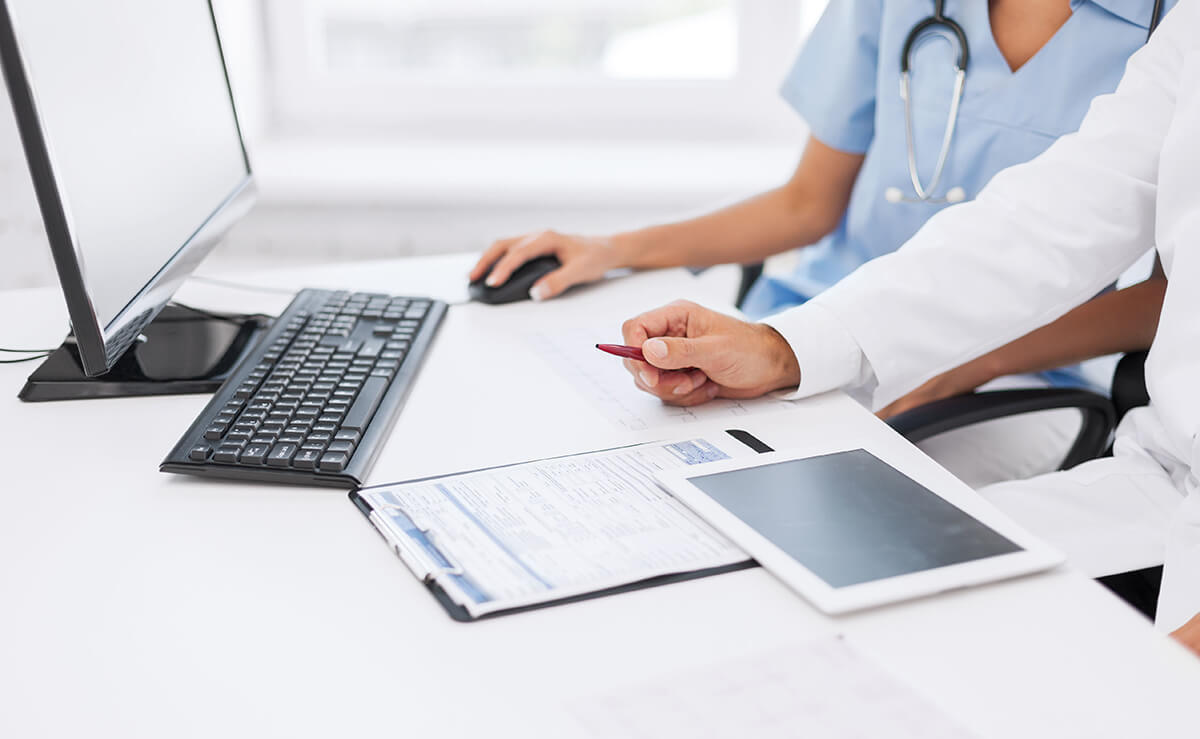 two people viewing eCCF electronic forms