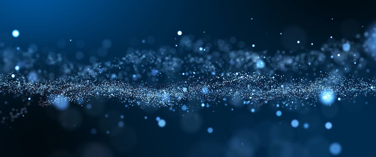 sparkles floating on a dark background