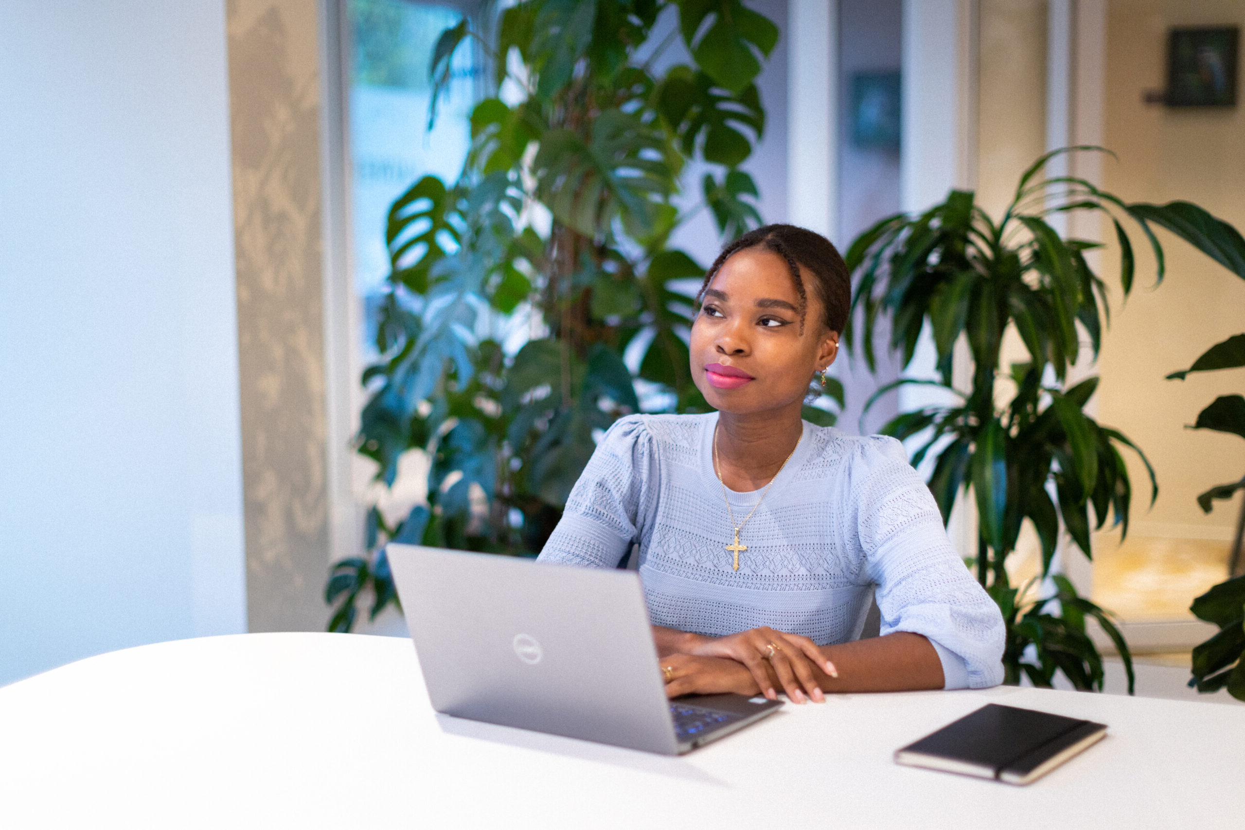 employee sitting in front of laptop
