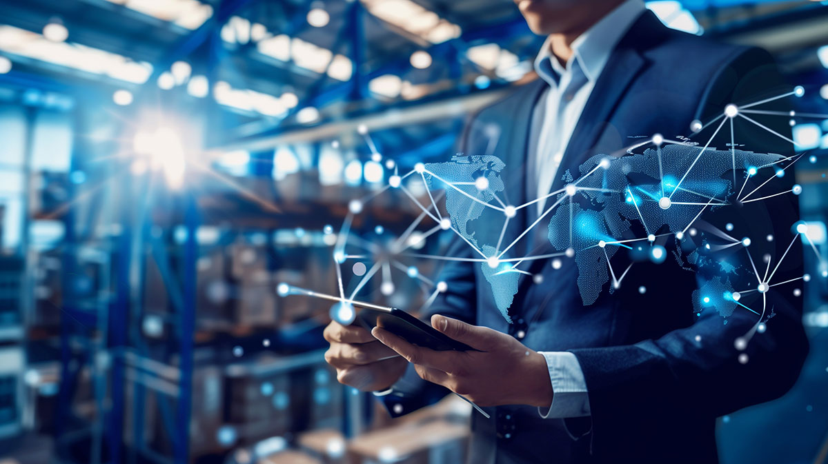business man touching a floating representation of technology