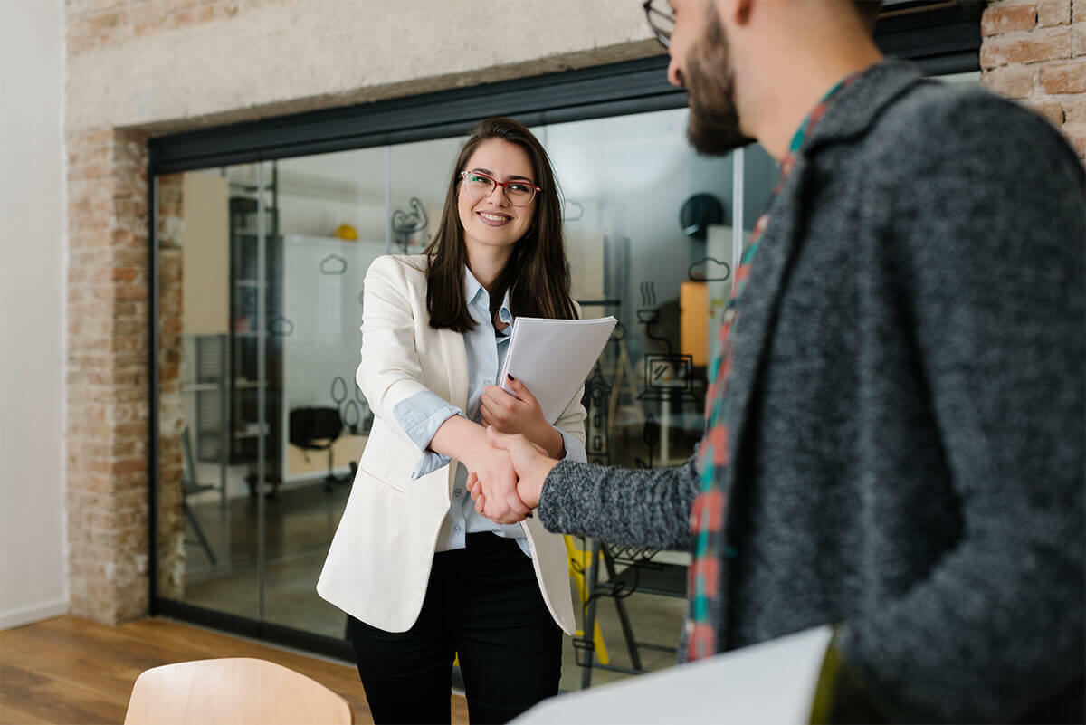 Recruiter and Candidate shaking hands, HR